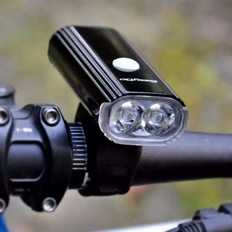 Prednja biciklistička svjetiljka: Značajke ciklotehni cikaloneaties. Kako odabrati snažnu LED i silikonsku svjetiljku s baterijom ili generatorom na upravljaču? Ocjenjivati ​​najbolje 20417_4