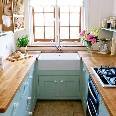 Meubles pour petites cuisines (54 photos): Petit meuble de cuisine pour petite cuisine, armoires, meubles et articles séparés, options de design d'intérieur avec mobilier 20944_38