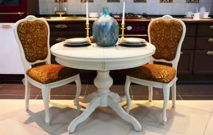 Tabeller för kök på ett ben (42 foton): Köksbord Ovala och runda former på det centrala stödet, glidande matbord på ett ben 21059_28
