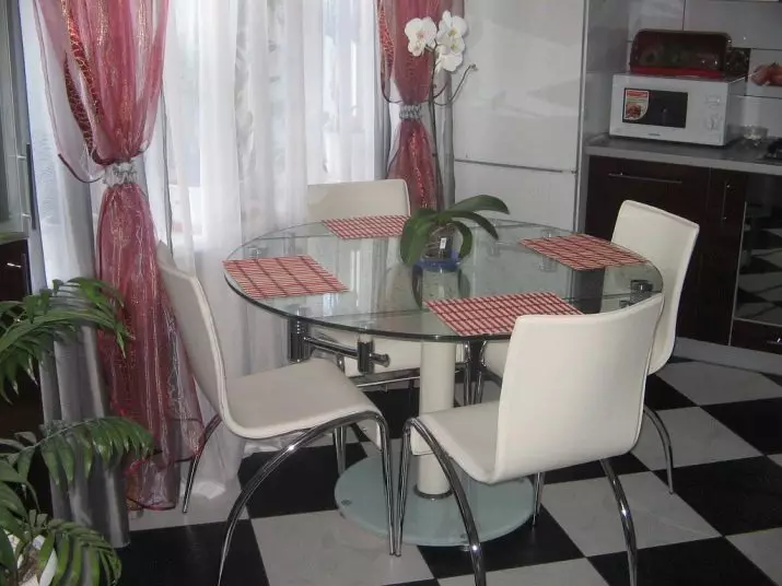 Tabeller för kök på ett ben (42 foton): Köksbord Ovala och runda former på det centrala stödet, glidande matbord på ett ben 21059_39