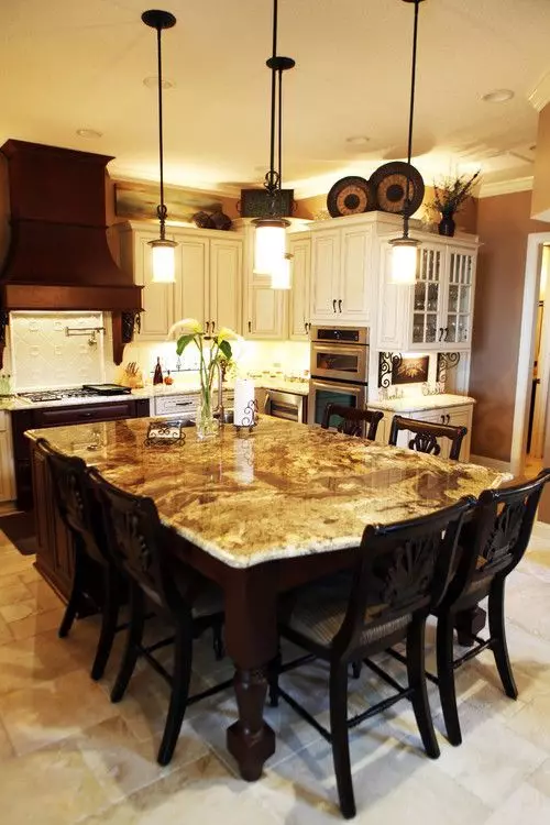 Virtuves galdi no mākslīgā un dabīgā akmens (48 fotogrāfijas): marmora galdi virtuvei, bīdāmās granīta akmens modeļi un citas iespējas 21079_19