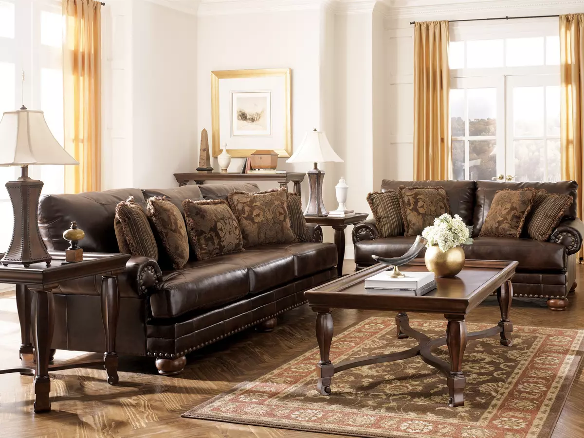 Divani in pelle nel soggiorno (28 foto): interior design con grande elite marrone e altri divani in pelle a colori 21230_14