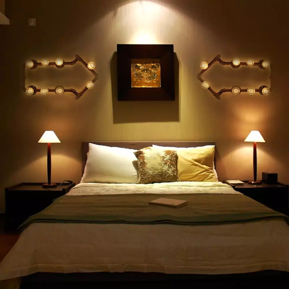 Rov v spalnici nad posteljo (54 fotografij): moderne stenske svetilke. Kakšna je višina od njih, da jih obesite? Pravilna namestitev suspenzij 21303_24