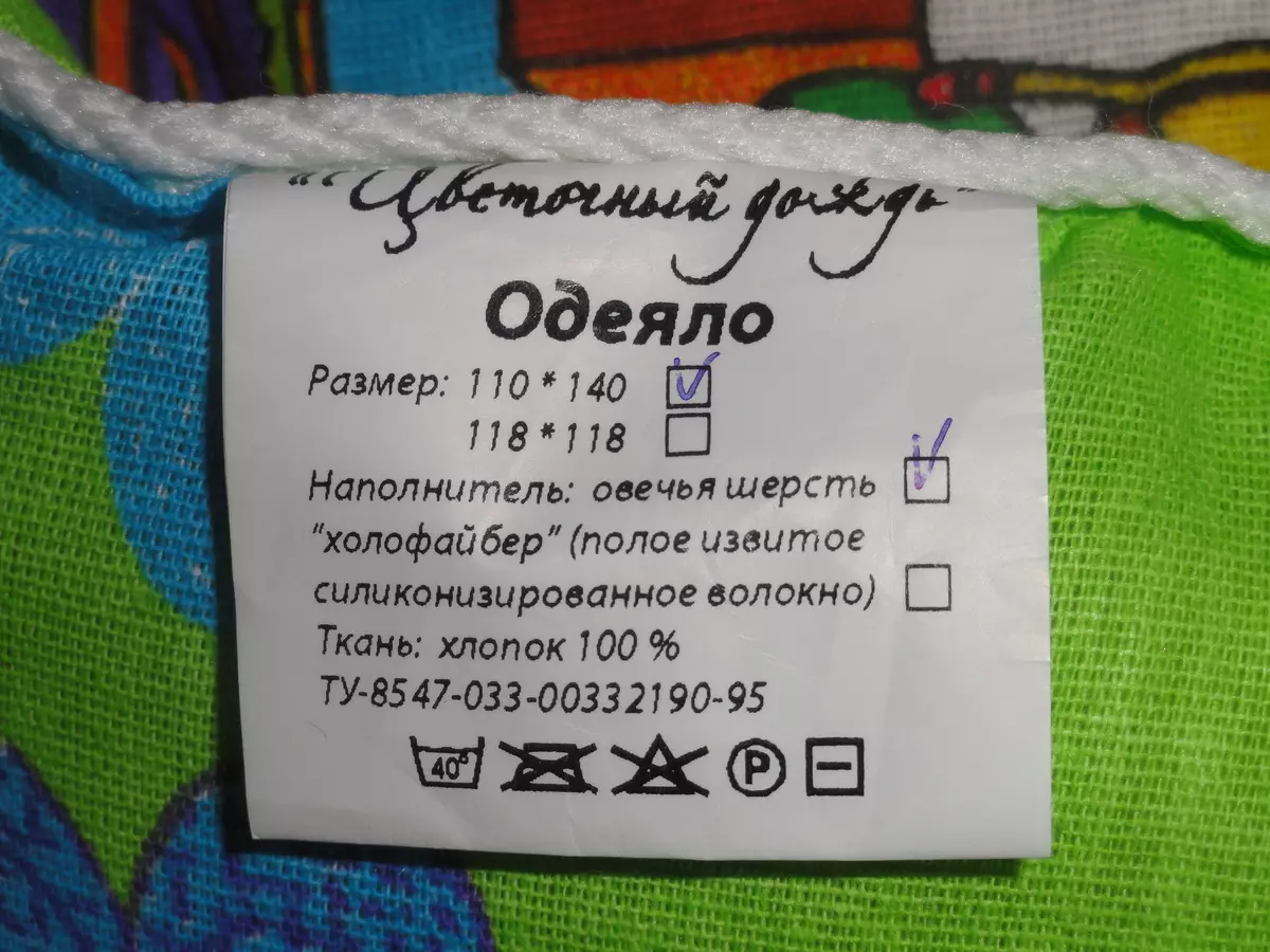 Schapenwol dekens: voor- en nadelen. Kan ik ze in een wasmachine wassen? Bont en gewatteerde dekens van Wit-Russische en andere productie, beoordelingen 21560_22
