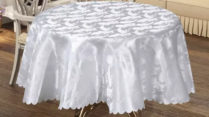 Baltās galdauti (35 fotogrāfijas): sniega balta galdauti uz kokvilnas galda un citiem, melnbaltiem un citiem skaistiem galdautiem 21608_16