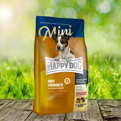 Alimentación do can de can feliz: seco e húmido, para cachorros de razas grandes, pequenas e medianas. Composición de conservas e outras fontes de cans, comentarios 22054_13