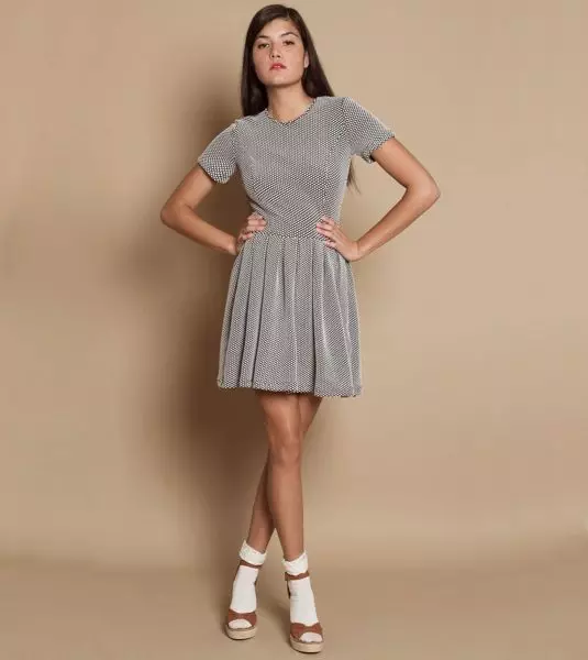 Pleated short silver dress.