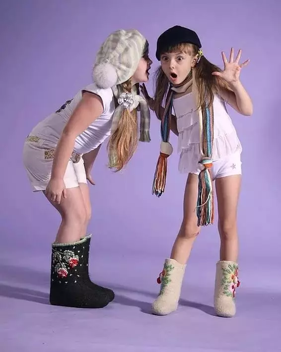Почувствувани чизми (97 фотографии): женски и детски чизми - чизми, топли зимски модели од почувствувани, со кои носат модерни природни чизми, осврти 2252_49