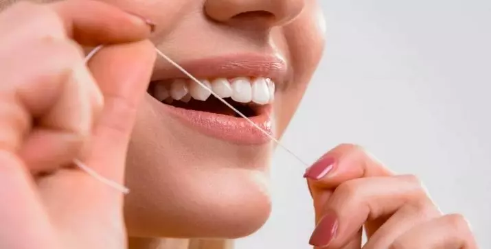 Oral-B fils dentals: com usar-los? Pro-Expert Line Clínica i Super seda, seda i setí essencial de la seda, la cera i el fil no gastat. Com obrir ells? 23988_12