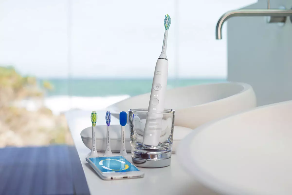 Vurdering af de bedste elektriske tandbørster: Topelektrolater til tænder, oversigt over mærker og sammenligning af modeller, de bedste børster i henhold til tandlæger 24000_3