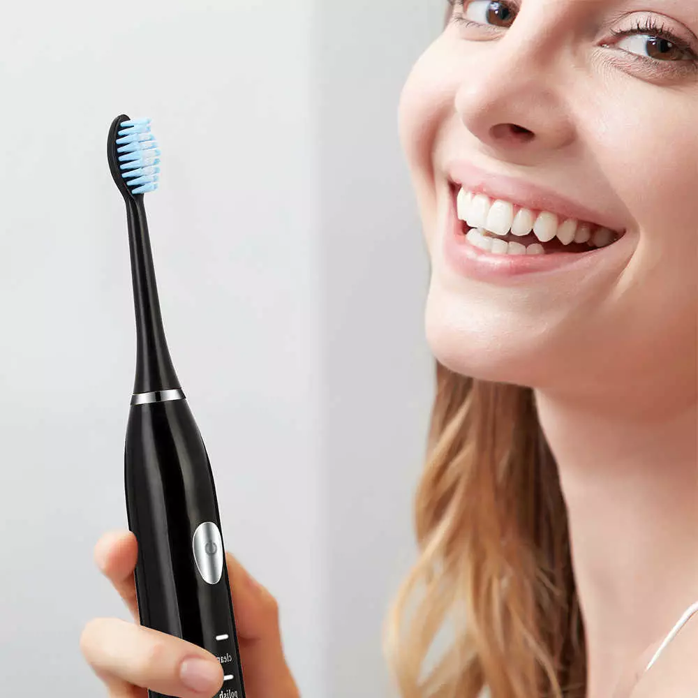 Vurdering af de bedste elektriske tandbørster: Topelektrolater til tænder, oversigt over mærker og sammenligning af modeller, de bedste børster i henhold til tandlæger 24000_38