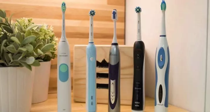 Vurdering af de bedste elektriske tandbørster: Topelektrolater til tænder, oversigt over mærker og sammenligning af modeller, de bedste børster i henhold til tandlæger 24000_57
