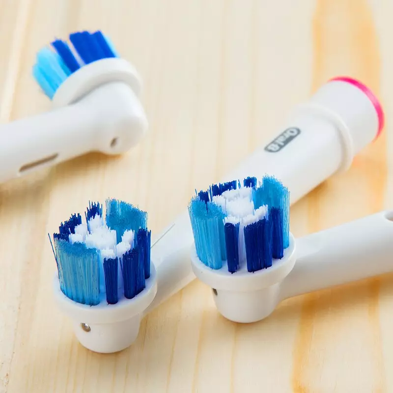 Tandenborstel: de beste borstels voor tanden, bamboe en ionisch, hoe te kiezen, handmatig en wegwerpbaar, andere soorten 24014_37