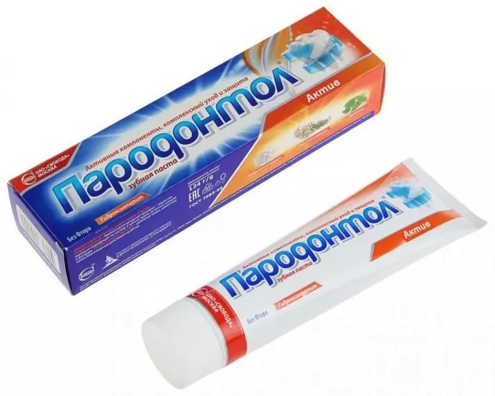 Pasta gigi tanpa fluor: Daftar pasta Rusia untuk gigi sensitif, peringkat pasta terbaik dengan kalsium tanpa fluor dan titanium dioksida. Apa perbedaan antara tempel dengan fluor dan tanpa? 24053_2