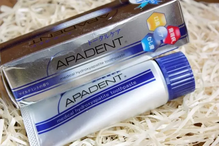 Toothpaste Apadent: gidjien tat-tfal u l-kura totali għall-adulti fl-imballaġġ blu, remineralizing għaġin Ġappuniż u oħrajn, kompożizzjoni u reviżjonijiet 24058_11