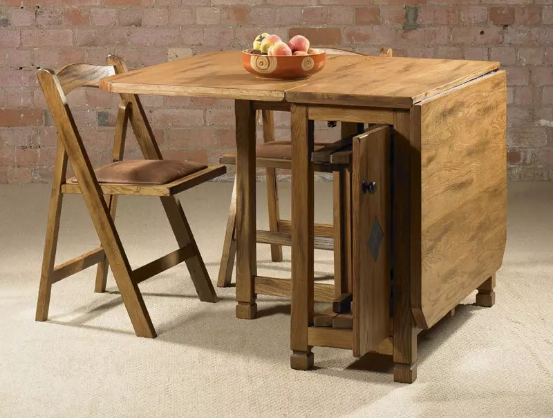Tables-Stands for Kitchen (50 foto): Model dapur dengan laci dan rak. Bagaimana cara mengambil meja di bawah wastafel untuk sebuah ruangan kecil? Tabel untuk hidangan 800x600x850 mm dan model lainnya 24852_15