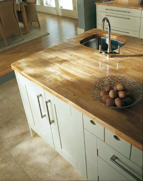 باورچی خانے کے لئے countertops کے طول و عرض (28 تصاویر): باورچی خانے کے countertops کے معیاری اور غیر معیاری سائز. باورچی خانے کے ہیڈسیٹ میں ٹیبل سب سے اوپر کی لمبائی کیا ہے؟ 24892_10