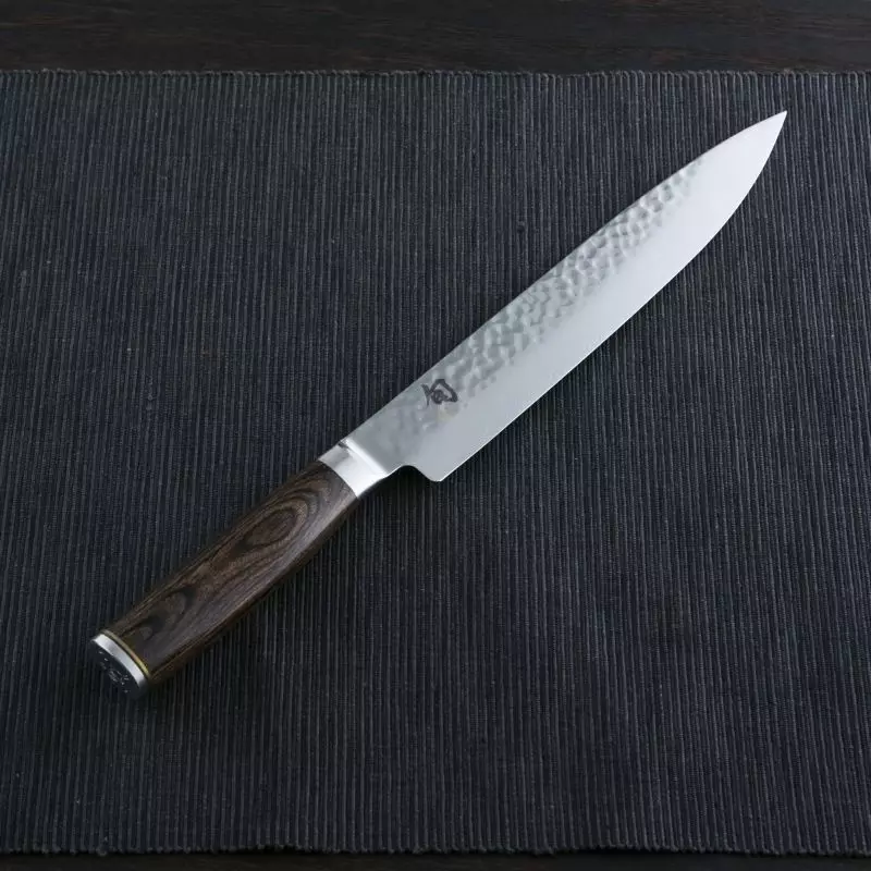 Трепка нож (31 фотографии): Како да изберете нож за сечење за сечење месо? Зошто ви е потребен универзален нож? Професионален сообраќај и други модели 24992_24