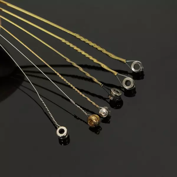 Akustik Gitar Dizeleri: Seçmek için ne daha iyi? Bir kalibre nasıl seçilir (kalınlık)? Metal ve yumuşak, gümüş ve diğer tipler, boyutlar 25474_8