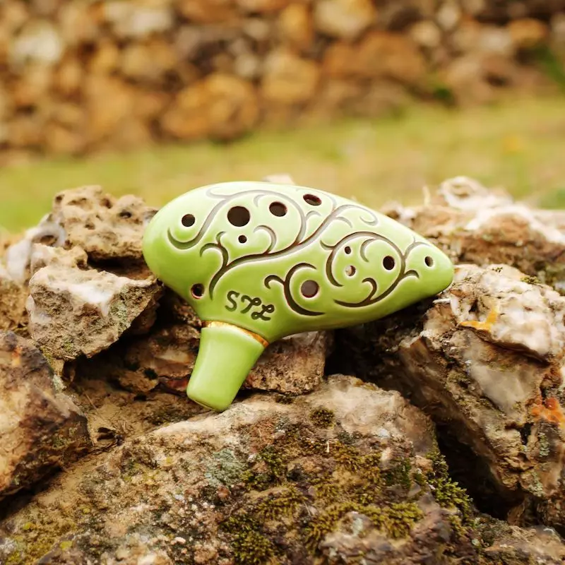 Ocarina: روح موسیقی آلہ. یہ کیا ہے اور Ocaroon پر موسیقی کیسے چلانا ہے؟ لکڑی اور دیگر، سیٹ اپ سے دو چیمبر ماڈل 25533_17