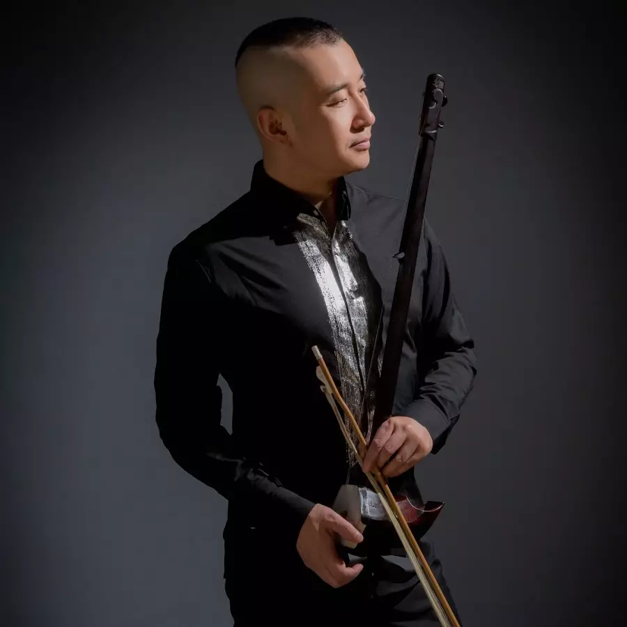 Erhu: Опис на стрингот музички инструмент. Играње кинески виолина. Зошто е така наречено? Како звучи музиката? 25584_16