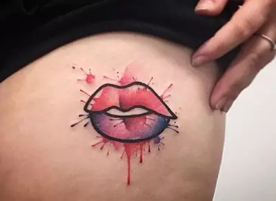 Tattoo in the form of lips: sketches. Tattoos on the neck and hands. The value of a tattoo in the form of a kiss for men and girls. Red lips with tongue and other options 257_25