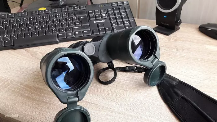 Binoculars Yukon: 10x50 agus 20x50, 30x50 agus 8-24x50, 16x50 agus 12x50, príosúnaigh agus samhlacha eile ón monaróir, athbhreithnithe ar úinéirí 26176_6