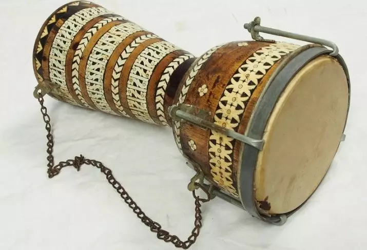 Darbuka (37 fotografii): Câte centimetri sunt înălțime? Joc de instruire pe un instrument muzical de șoc, ritmurile tamburului și muzicii arabe 26220_23