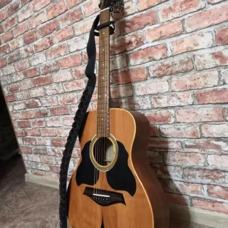 Guitars alang sa tudlo: ang labing kaayo nga labing maayo nga mga modelo, ang gitas-on sa pisi sa buwitre. Giunsa pagpili? Mga gidak-on sa acoustic ug uban pang mga tudlo sa tudlo 26232_6