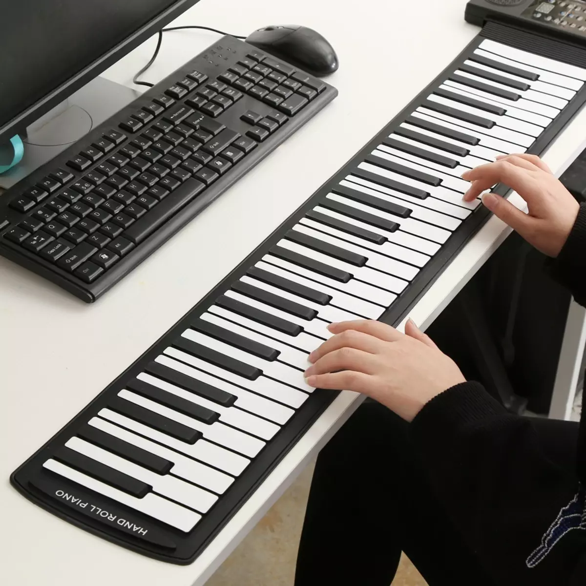 Pianoforte flessibile: pianoforte morbido con tasti da 49, 61 e 88, caratteristiche della tastiera, migliori modelli, recensioni dei clienti 26281_2