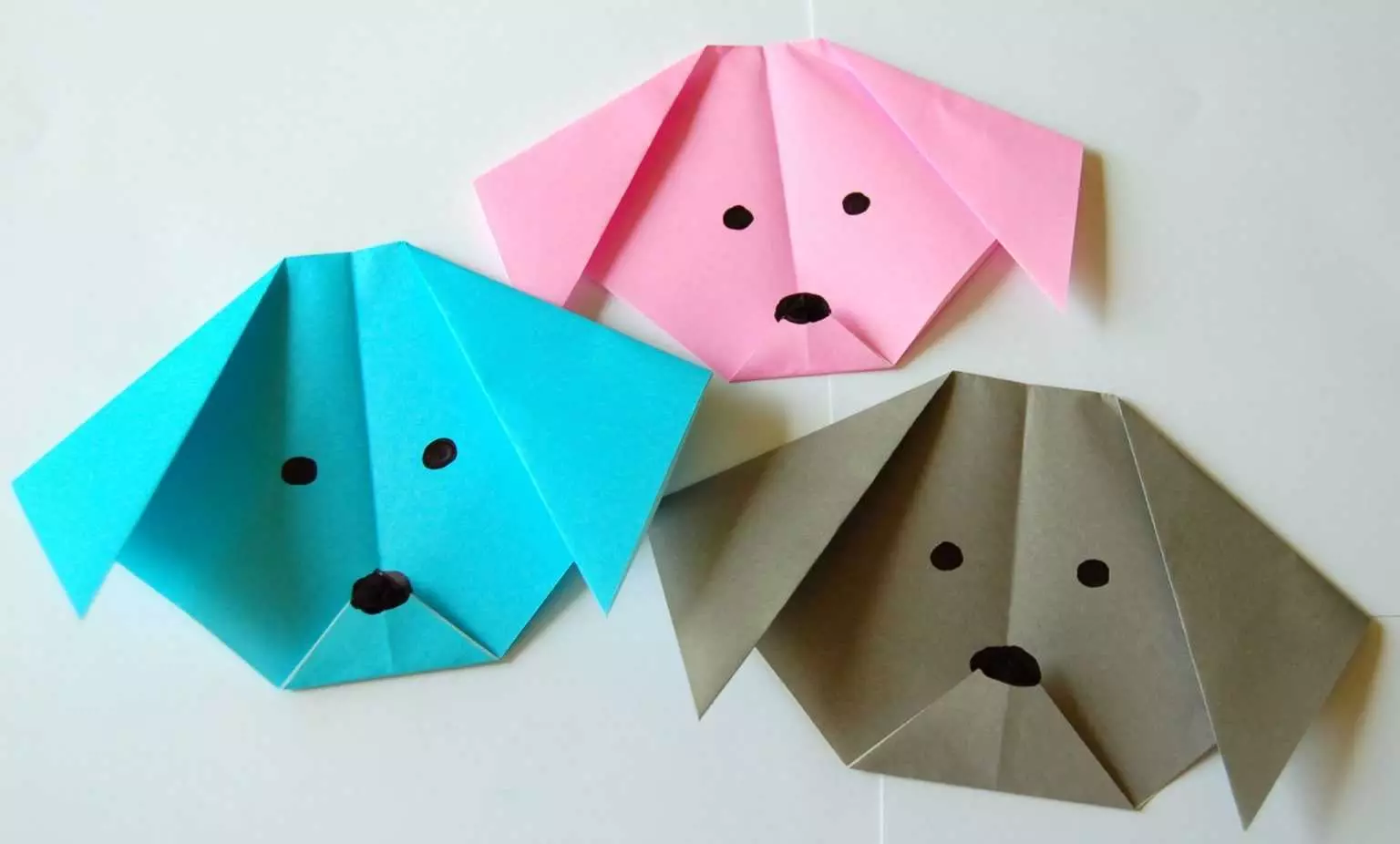 Origami (97 foto): cos'è? Figure dell'8 marzo del notebook. Tipi di artigianato di carta pieghevole artistico giapponese. Come fare diverse figure? 26950_41