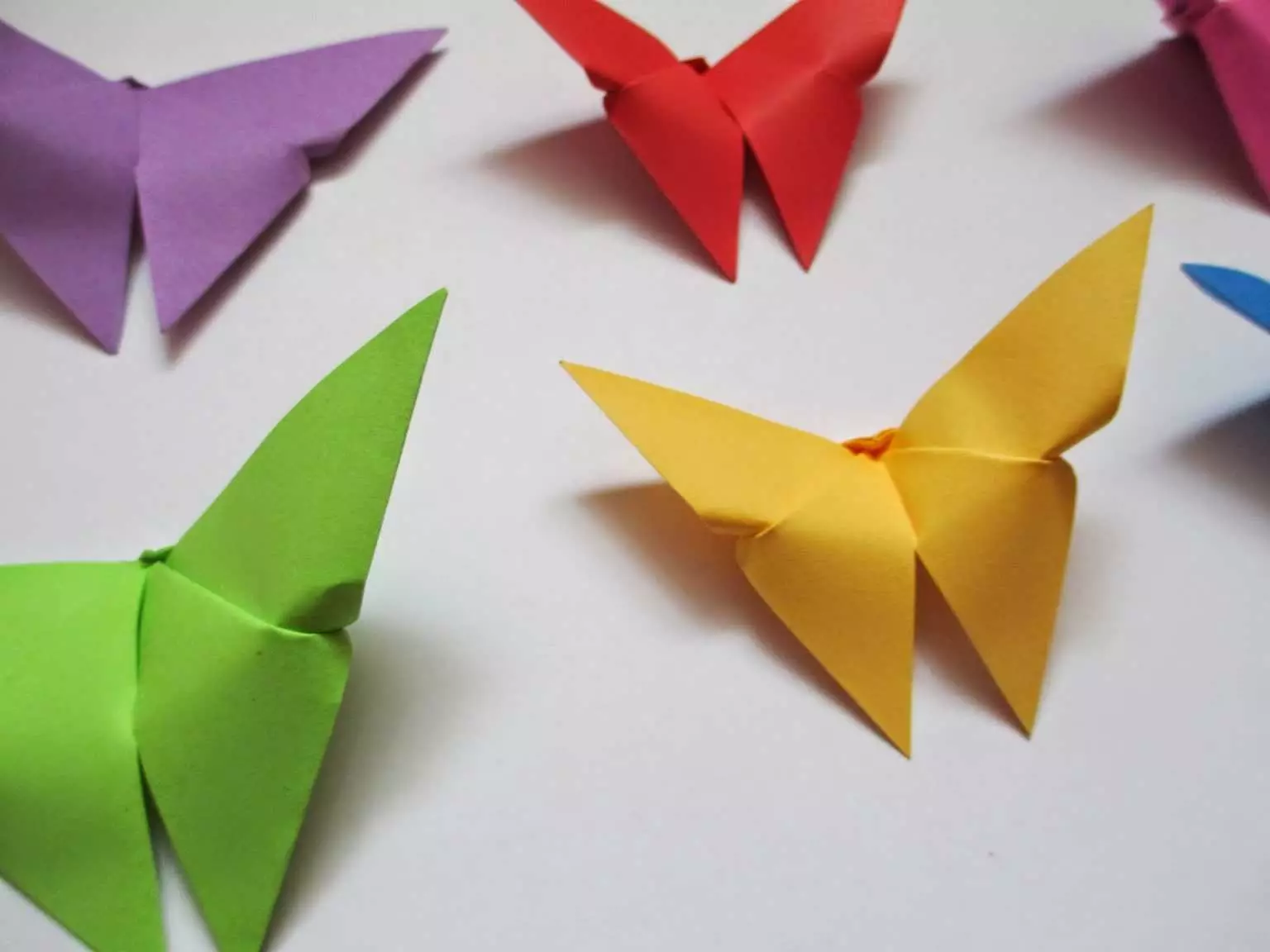 Papir origami for barn 7-8 år: enkle ordninger for gutter og jenter. Hvordan lage origami gjør det selv i etapper? 26984_2