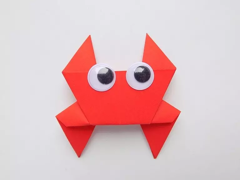 Оригами «Краб»: балалардың схемасына сәйкес қағаздан краб. Нұсқаулықтардың қадамдарында қарапайым крабты қалай жасауға болады? Модульдік краб Потпно 27036_9