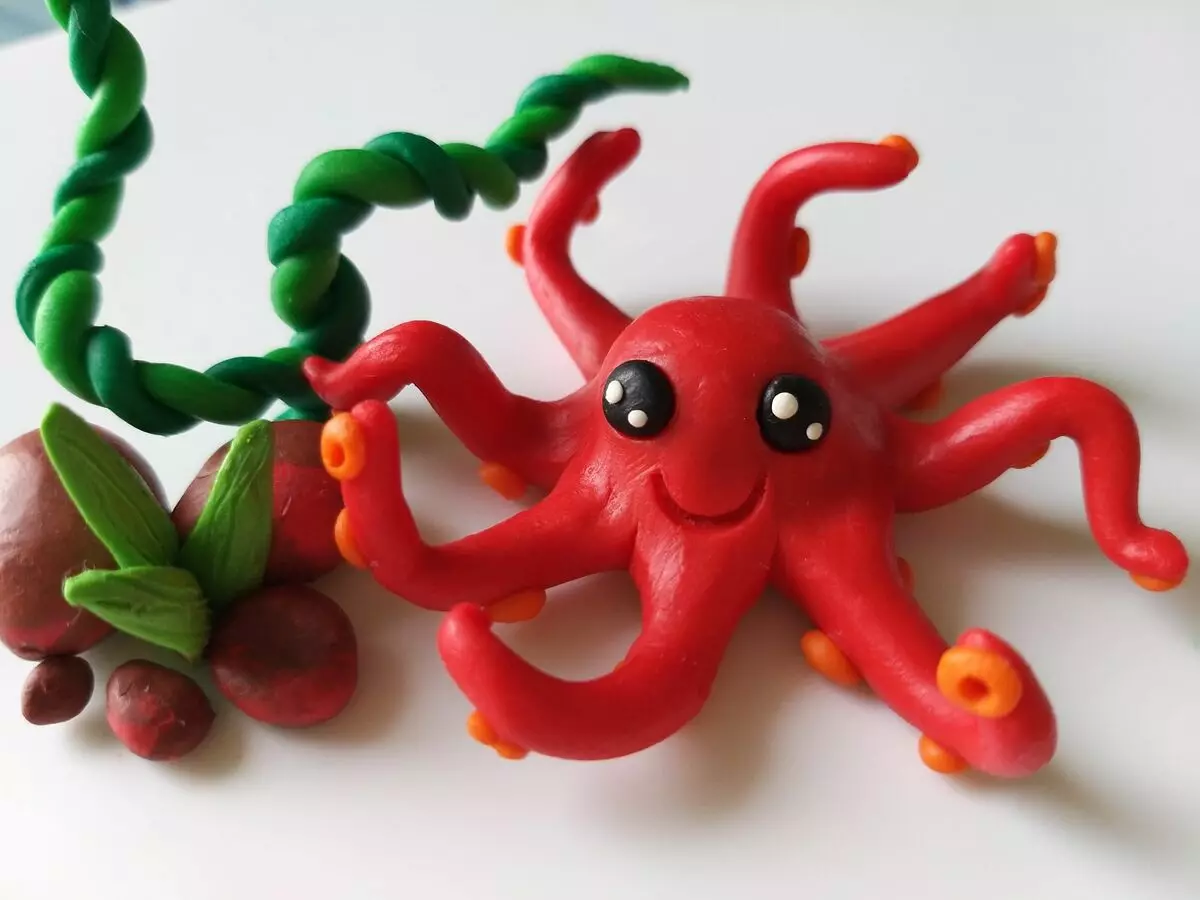 Octopus fan plasticine: Hoe kinne jo it bern meitsje op karton stap foar stap? Hoe kinne jo in bulk octopus meitsje yn stadia? TIPS OP LJOCHT 27180_2