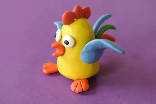 Plasticine kylling: skubbe med bump. Hvordan gør det trin for at træde for børn i 3-4 år? Hvordan man laver en sød kylling i etaper gør det selv? 27199_4