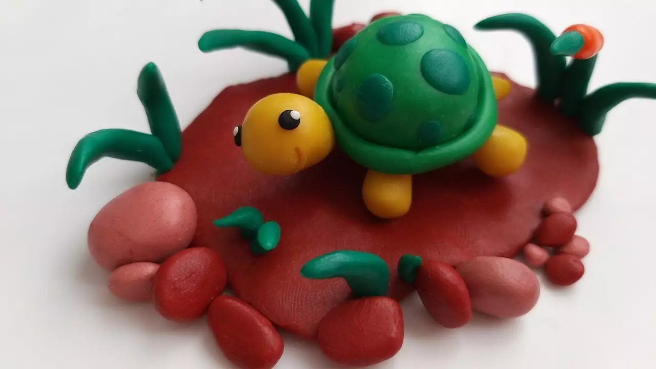 Tortuga de plastilina (57 fotos): Com fer una tortuga per als nens de la closca de plastilina i de noguera? Maspeake amb cops. Com fer-ho de la plastilina en cartró?