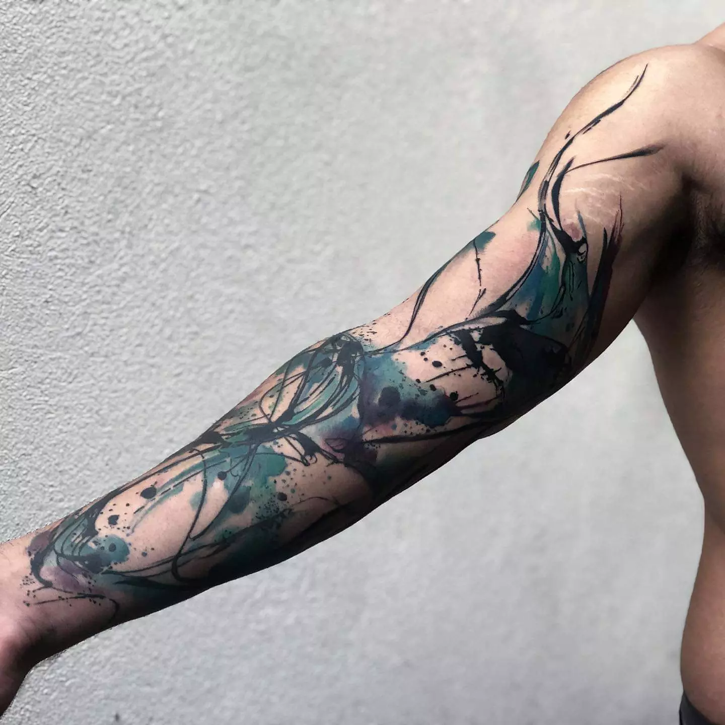 Tatuaxe en estilo Abstracción: bocetos para nenas e para rapaces, tatuaxe na man e no ombreiro, no pescozo e na perna, na parte traseira e noutras partes do corpo, o seu significado 277_18