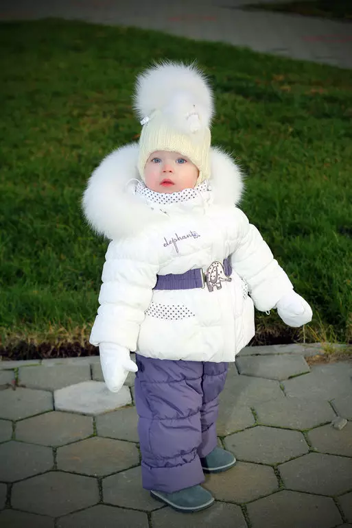 Módne zimné klobúky (185 fotografií): Moderný móda na uzávery na jeseň a zimu, pre ženy po 50 rokoch 2932_67