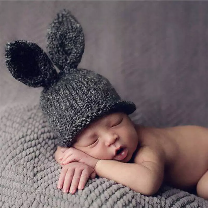 Зимске капе за новорођенчади (59 фотографија): кацига, плетени топли модели, од Если, шешир са зеконим ушима, вунени, на екстракту 2963_14