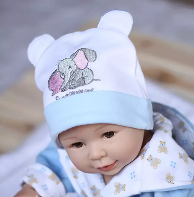 Зимске капе за новорођенчади (59 фотографија): кацига, плетени топли модели, од Если, шешир са зеконим ушима, вунени, на екстракту 2963_47