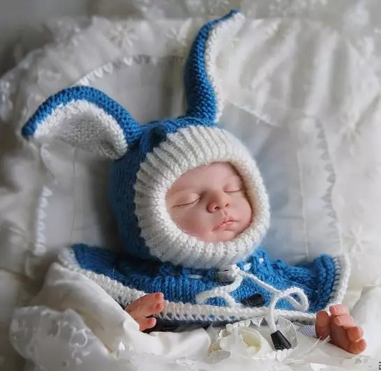 Зимске капе за новорођенчади (59 фотографија): кацига, плетени топли модели, од Если, шешир са зеконим ушима, вунени, на екстракту 2963_6