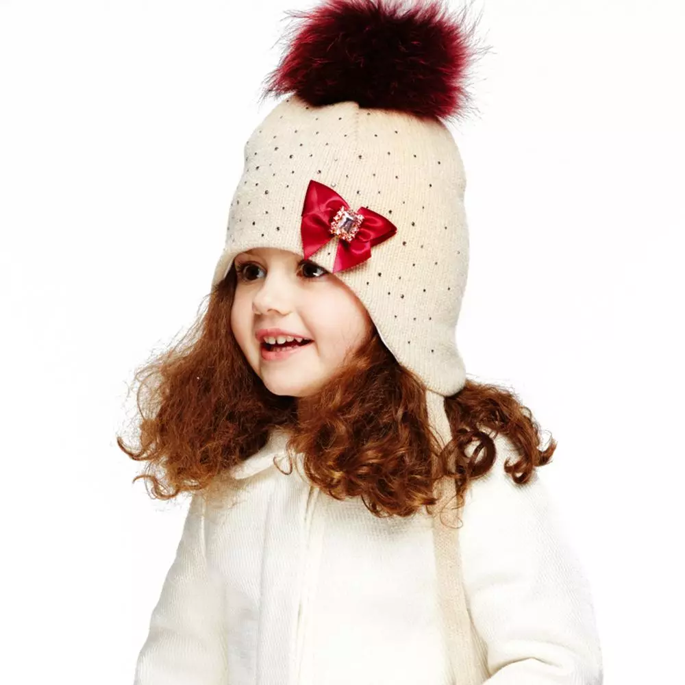 шапката на Нова година (55 снимки): Дядо Коледа с брада и Дядо Коледа, фокусник шапка в детска градина, плетени модели на викинг, люкове-Ushanki 2981_51