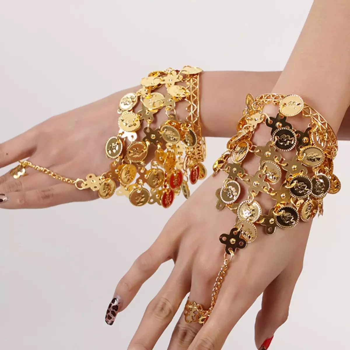 دستبند هند (55 عکس): مدل های دست با سنگ های طبیعی، مجموعه ای در سبک شرقی، آنچه آنها برای یک دختر معنی می دهند 3023_42