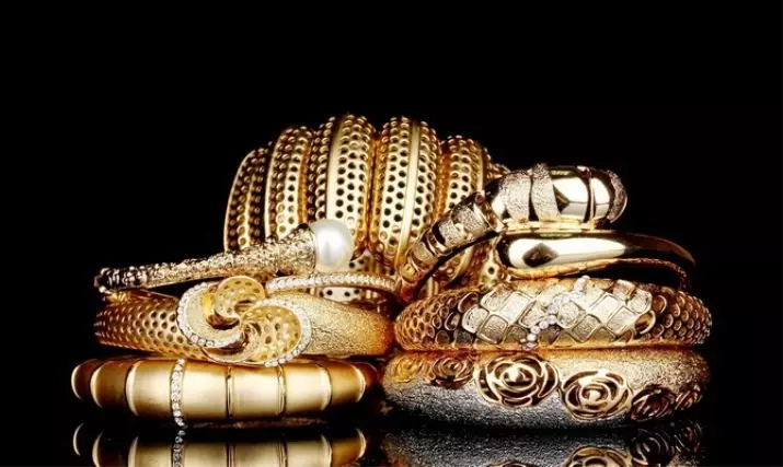 Braccialetto d'oro con topazio (79 foto): modelli femminili a portata di mano con granata, zaffiri e smeraldi, fianit e altre pietre 3041_77