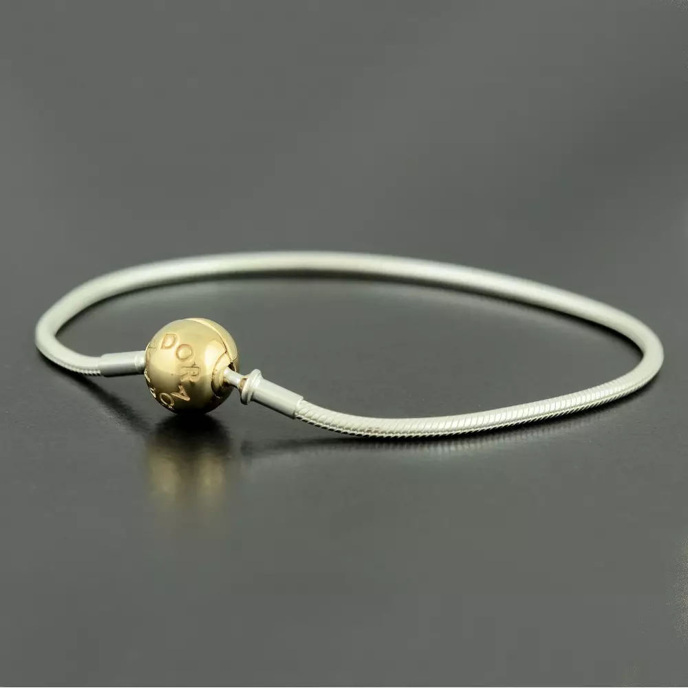 Zlata zapestnica Pandora (38 fotografij): modeli s srebrnim šarmom z zlatom, usnjem in zlatom, pregledi 3068_22