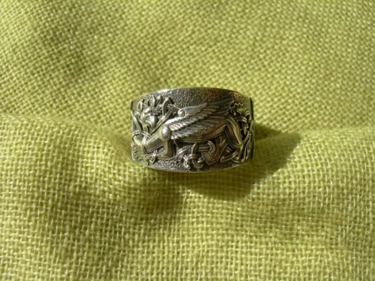 Словенски прстени (77 фотографии): карактерни прстени со симболи на антички Словени и руни, женски плетен модели 3095_35
