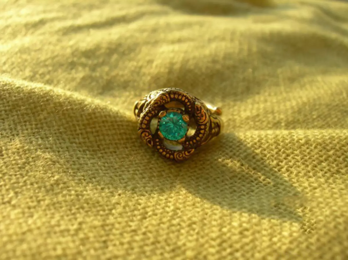 Словенски прстени (77 фотографии): карактерни прстени со симболи на антички Словени и руни, женски плетен модели 3095_76