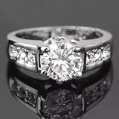 스와 로브 스키 링 (42 장의 사진) : 크리스탈과 모조 다이아몬드 모델, 전체 기능 및 귀걸이 세트 3117_11