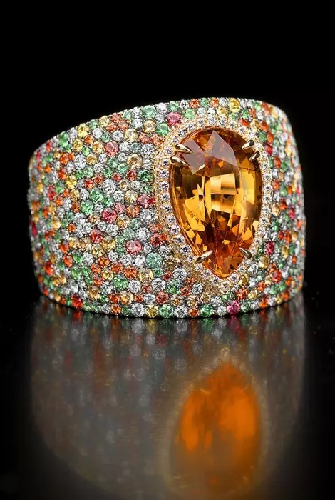 Prsten sa granatom (72 fotografije): Zlato i srebro, sa zelenom bojom i frizitijem, sa velikim i malim kamenom 3118_5