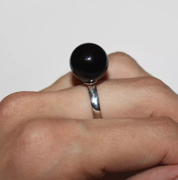 Srebrni prstenovi sa kamenjem (116 fotografija): Ženski modeli sa mjesecom i crnim kamenom u srebru 3124_64